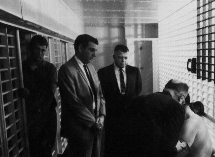 16James Earl Ray being searched 06.jpg